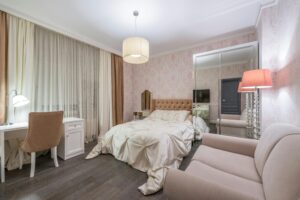 Stylish bedroom with pink interior